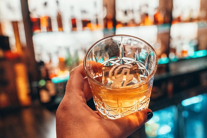 Beyond the Barrel: NuLu Walking Bourbon & Food Pairing Experience - Sunset rooftop finish at Tempo by Hilton: Mint Julep, dessert, skyline