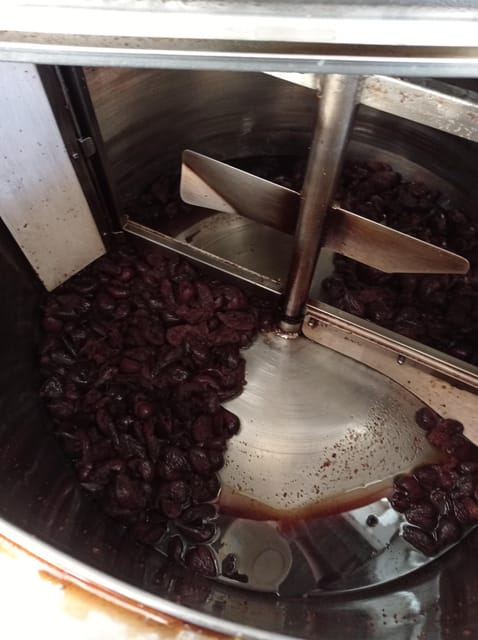 Ischia: Private Distillery Tour and tasting with the Artisan - Inside the open-space distillery where the copper pot still faces the street