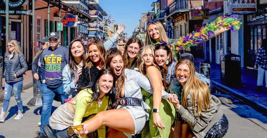 New Orleans: Guided Bourbon Street Bar Crawl with Shots - The crawl cup: your passport to drink deals