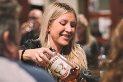 Premier Distillery & Craft Brewery Bus Tour with 9+ Tastings - Start at Green Light Bar, then get your first tasting momentum