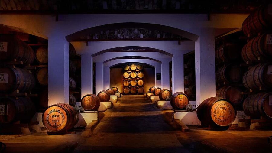 Segovia: Guided tour of the DYC Distillery with whiskey tasting - Entering the DYC distillery in Segovia’s high setting