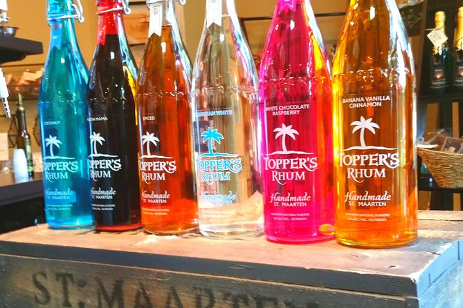 Topper's Rhum Distillery Tour in St Maarten - The Tasting Bar: Over 20 Samples and a Huge Flavor Wall