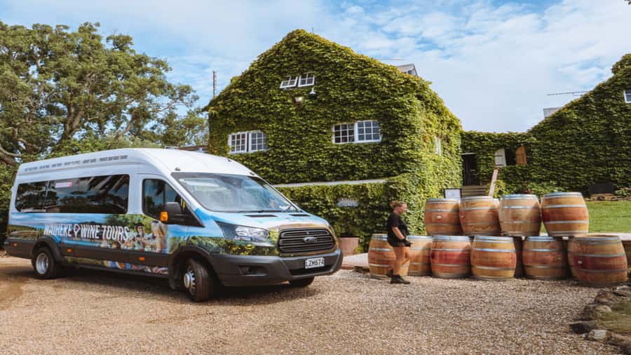 Waiheke: Scenic Taste and Graze Tour with Wine, Whisky, Beer - Stonyridge Vineyard lunch: platters, wine, and the high-point view